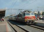 3047 am 06.09.2002 mit abfahrbereiten Personenzug in Tampere.