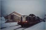 Der Schnellzug 5753 von Morez nach Paris beim kurzen Halt in Morbier mit den beiden BB 66 594 und BB 66 497.