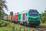 475128 zerrt 185 160-9 und ihrem Zug nach Wörth. In wenigen Minuten ist der Bahnhof Lauterbourg erreicht. (19. August 2024)