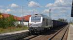 75101 der HSL zog am 12.08.12 einen Hochbordwagenzug durch Delitzsch u.