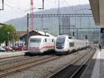 DB / SNCF - Nachschuss von DB ICE 401 582-2 und dem endgegenkommende TGV/Lyria 4404 bei der durchfahrt im Bahnhof Sissach am 06.04.2014