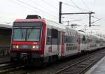 Triebwagen 20751 mit V2BN-Doppelstockwagen der Ile de France am 15.10.2008 auf einer RER-Strecke bei Paris, die Zge fuhren frher mit Lokbespannung, in den drei Tagen habe ich Ile de France-Zge nur noch mit Triebwagenbespannung gesehen. 