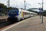F-SNCF 50 87 80-97 131-5 führte am 20.08.2014 den TER (Basel SBB (SNCF) - Strasbourg), als dieser mit der Schublok BB 26149  ORLÉNANS  in den Bahnhof von Mulhouse Ville fuhr.