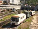 BW Bastia 30.8.07: Blick von der Straenbrcke zeigt viele vergammelte Trieb bzw Beiwagen