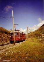 Triebwagen  Jeanne  der Tranway du Mont Blanc TMB (Meterspur Adhäsions- und Zahnradbahn)  am Col du Mont Lachat 2077m, im September 2004.