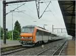 Die SNCF BB 26144 Sybic mit einem TER 200 beim Halt in St-Louis.