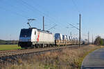 186 366 der akiem führte am 05.12.24 einen mit Transportern der Marke Toyota beladenen BLG-Zug durch Wittenberg-Labetz Richtung Dessau.