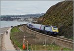 Und schon kommt der schnelle HST 125 als  The Cornish Riviera  GWR Service 0844 von Penzance nach Paddington bei Red Rock um die Kurfe und erreicht Dawlish Warren. 
18. April 2016