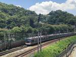 2024.08.03, R-Train departed from Tai Po Market station and runs toward Tai Wo, on rooftop of Tai Po Market Wet Market.