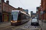 Citadis 301 3014 fährt die Benburb Street entlang in Richtung Museum und Heuston Station. Die Straßenbahn wurde in Dublin 1959 stillgelegt und seit 2004 baut man wieder ein Straßenbahnnetz auf. 

Dublin 10.01.2025