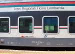 Beschriftung eines nB-Peronenwagens der TILO (Treni Regionali Ticino Lombardia)), aufgenommen am 15.07.2007 in Tirano. Wer Teilhaber dieser Gesellschaft sind sieht man deutlich.