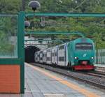 Ale 506 034 (Treno 34) am 16.05.2013 als Regio auf dem Weg nach Roma Termini. Hier ist der Triebzug bei der Einfahrt in Roma Valle Aurelia.
