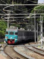 Der R 6215 (ein unbekannter Triebzug Ale 801/940) verlässt den Bahnhof Imperia P.M. richtung Savona, am 03.06.2014. 