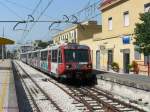 ETR054+ETR040 der 950mm-spurigen Circumvesuviana-Bahn sind hier aus Neapel kommend im Endbahnhof der Zweigstrecke nach Sarno zu sehen.
2010-08-25 Sarno