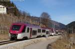 A couple of ETi of Trentino Trasporti transit near of Tozzaga with the local train n.25 from Mal to Trento.