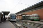 Italien / Sardinien / Straenbahn Cagliari / Stadtbahn Cagliari: koda 06T mit der Wagennummer CA 03 der Metrocagliari sowie ein Triebwagen ADe der FdS (Ferrovie della Sardegna), aufgenommen im Juni 2014 an der Haltestelle  Monserrato San Gottardo  in Cagliari.