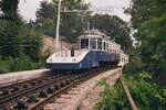 Tram Triest-Opicina__Seilbahn-Schubwagen Nr.2 schiebt Tw bergauf, kurz vor dem oberen Ende des Seilbahnabschnitts.__08-06-2008