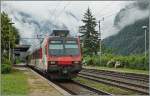 Ein  Walliser  Domino fährt als IR 3315 ohne Halt durch Varzo.
2. Juli 2014