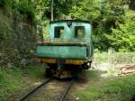 Sdtirol,Laas im Vinschgau.Laaser Marmorbahn.Die  Tallok  1930(TIBB/ C&T)wartet am unteren Teil des Schrgaufzugs auf die Plattformwagen mit den Marmor Roh-Blcken.Es gab noch eine dritte Lok,die 1941