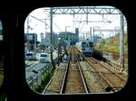 Sanyô-Konzern: Der Expresszug 5018 (Baujahr 1988) begegnet unterwegs nach Osaka in Nishi Maiko, 22.März 2014.