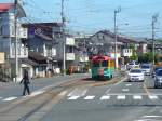 Serie 600 unterwegs: Wagen 603 wartet an der Haltestelle Kagamigawa-bashi; von hier geht es einspurig weiter.