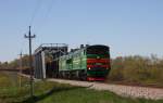 Villani in Lettland an der Strecke Jekabpils - Rekzene. Gerade durchfhrt
ein Gterzug mit der schwere Doppel Lok 2T310Y-0215 die Gitterbrcke
am westlichen Ortsrand auf dem Weg nach Rekzene am 1.5.2012.