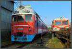 D1 593-3 steht am 02.09.2024 neben ER9M 390-01 im Eisenbahnmuseum Vilnius.