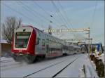 Einfahrt der RB 3214 Luxembourg-Wiltz am 25.12.2010 in den verschneiten Bahnhof von Ettelbrck.