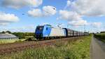 Alpha Trains Luxembourg 185 518-8, vermietet an CCW, mit leerem Kokszug DGS 89253 Bremen Stahlwerke - Bottrop Süd (Bohmte, 29.09.2024).