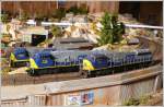 GE C 30-7 7007, EMD SD 70MAC 713 und EMD SD 80MAC 801 der CSX. Hersteller: alle Kato. (01.06.2009)