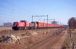 Opel Logistikzug bei Babberich am 20.02.2003. Railion 6518 und 6509 mit Zug 47108 (Bochum Langendreer - Antwerpen Oorderen), aus Wageneinheiten Hirrs-tt325. Scanbild 8574, Fujichrome100.