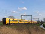 Buffels 3406, 3421 und 3416 mit Regionalzug 9157 Zwolle-Groningen bei Staphorst am 2-4-2010.