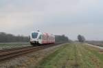 Spurt 10314 “Jopie Huisman” (Arriva) mit Regionalzug 37838 Veendam-Groningen bei Waterhuizen am 3-1-2013.

