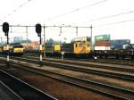 2245, 2248, 2400 und 1127 auf Bahnhof Almelo am 9-8-1988. Bild und scan: Date Jan de Vries. 