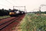 1101 mit Gterzug 45502 Bremen-Kijfhoek auf Bahnhof Barendrecht am 15-7-1994.