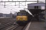 Am 21.1.1989 hlt NS Elektrolok 1138 um 11.00 Uhr mit einem IC nach Enschede
am Bahnsteig in Hengelo.
