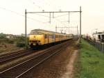 Plan T 520 und Plan V 890 mit Eilzug 3642 Roosendaal-Zwolle bei Elst am 15-5-1996. Bild und scan: Date Jan de Vries.