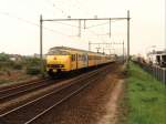 520 und 890 mit Eilzug 3642 Roosendaal-Zwolle auf Bahnhof Elst am 15-5-1996. Bild und scan: Date Jan de Vries.