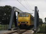 Plan V 964 mit Regionalzug 8052 Emmen-Zwolle bei De Haandrik am 18-9-2012.