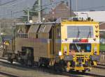 Eine Gleisstopfmaschine des Typs  09-16 CSM  stand am 31.10.09 im Bahnhof von Roermond.