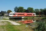 Arriva nr 263 als Zug 31134 (Arnhem Centraal - Tiel) passiert die Brücke der Linge in Opheusden, 07.09.2023. Digi 23062.