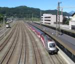 1116 249 verlsst am 02. August 2013 mit Railjet-Garnitur  175 Jahre Eisenbahn fr sterreich  den Bahnhof Kufstein.