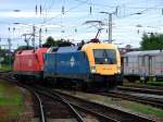 1047 010 und ein weiterer Taurus am 16.08.2007 bei der Einfahrt in Wels Hbf.