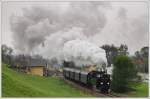 GEG 77.28 mit dem Fotozug 91159 von Attnang-Puchheim nach Hausruck aufgenommen kurz nach dem Bahnhof Attnang-Puchheim.