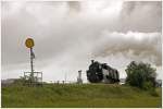 77.28 mit dem Foto-Gmp Z91148 (Hausruck-Attnang-Puchheim) am 6.8.2010 beim  Vorsignal des Bhf Hausrucks.