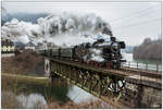 Die ÖGEG Dampflok 78.618 fährt als SR 14483 von Timelkam über den Graben und das Gesäuse nach Admont, hier zu sehen auf der Ennsbrücke in Trattenbach.