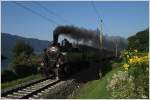 Vorbei am wunderschnen Ossiachersee, fhrt die NBiK Dampflok 93.1332 mit dem IGE Sonderzug Sdz 17196 von Villach nach St.Veit an der Glan.