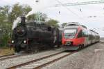 Good old meet modern times: NLB 93.1420 mit dem SR 17457 nach Pamhagen kreuzt am 22.09.2012 im Bf.