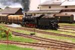 *Modell*  Mitte der 1950er verschiebt im Bahnhof Steindorf bei Straßwalchen die 1918 gebaute 657.1590 nach ihrer Ankunft aus Braunau am Inn bevor die Fahrt nach Salzburg Gnigl Vbf weitergeht.