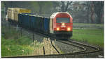 2016 054 fährt mit einem Hackschnitzelleerzug von Pöls nach Zeltweg, aufgenommen mit einer 1000mm Russentonne (UDSSR Bj 1977 :O) 
Fohnsdorf 07_04_2016